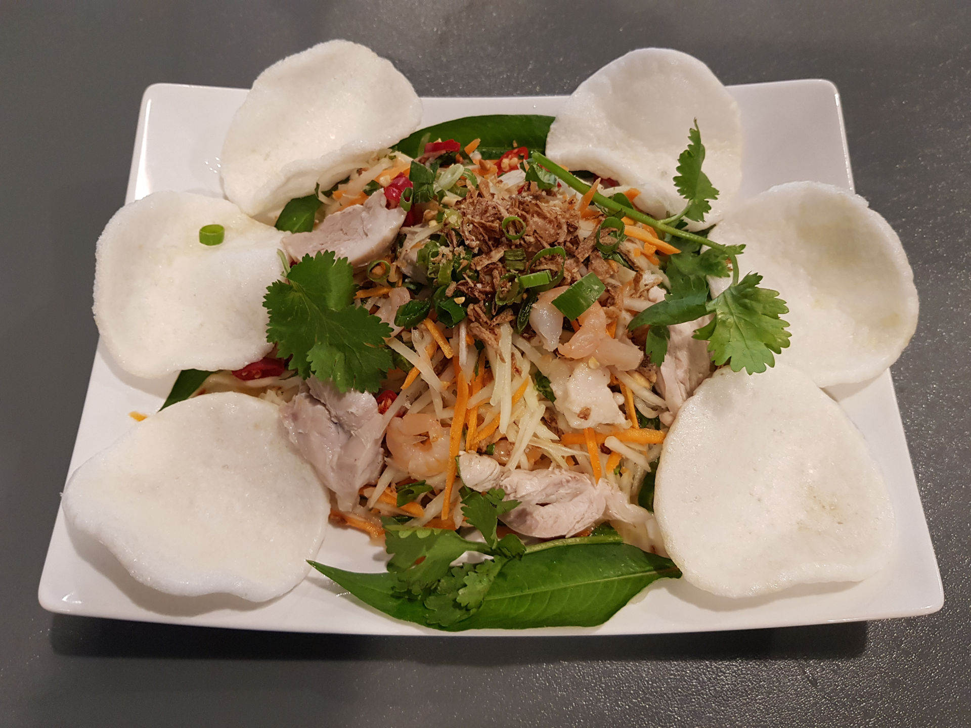 Green papaya salad with prawns and pork